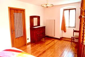 Postel nebo postele na pokoji v ubytování Casa rustica di montagna