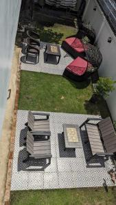 an aerial view of a patio with tables and chairs at 102 Casa de Rany in Dumaguete