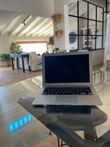 TV a/nebo společenská místnost v ubytování Precioso Apartamento Boutique El Amante