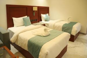 Hotel Scala客房内的一张或多张床位