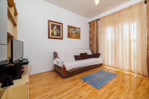 Ein Bett oder Betten in einem Zimmer der Unterkunft Apartments Zvonimir