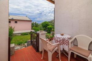 Ein Balkon oder eine Terrasse in der Unterkunft Apartments Zvonimir