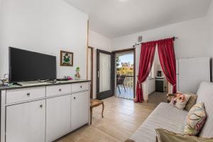 TV a/nebo společenská místnost v ubytování Apartments Masa
