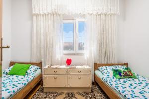 Postel nebo postele na pokoji v ubytování Apartments Masa