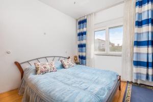 Postel nebo postele na pokoji v ubytování Apartments Masa