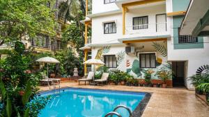 Bazén v ubytování Olive Hotel Calangute Niwasa by Embassy Group nebo v jeho okolí