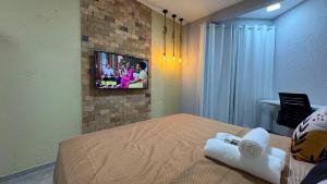 TV a/nebo společenská místnost v ubytování Casa 500 m da Orla de Atalaia em Aracaju - Village D