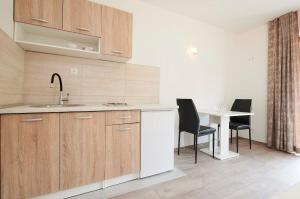 Kuchyňa alebo kuchynka v ubytovaní Apartments Antonia