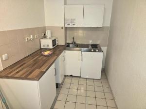 Cuina o zona de cuina de City Apartment Köln