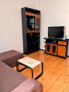 A television and/or entertainment centre at Serdika station, bright and cozy apartment