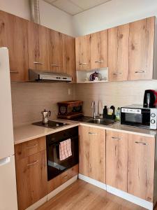 A kitchen or kitchenette at Serdika station, bright and cozy apartment