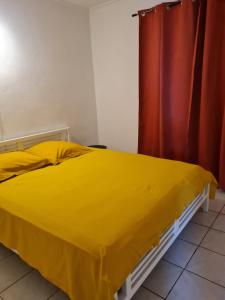Postel nebo postele na pokoji v ubytování bienvenue a la maison