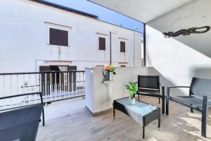 Posezení v ubytování Appartamento Onda Luxury - MyHo Casa