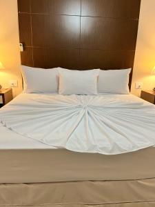 Postel nebo postele na pokoji v ubytování Imperador Palace Hotel Franca
