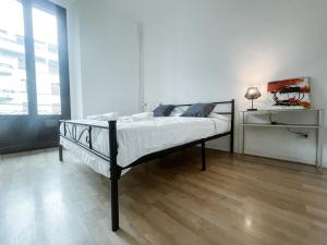 Un pat sau paturi într-o cameră la Borsieri Loft Milano - Isola Design District