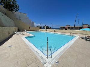 Bazén v ubytování Apartamento Playa vistas 2 nebo v jeho okolí