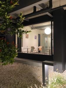 a view of the dining room from the house at THE CELESTRAIL - Apartment - Check-In by Appointment Only - Non-hotel - Onnut BTS in Bangkok
