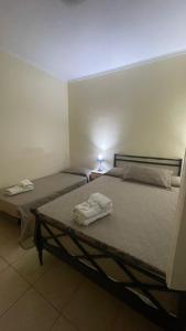 Кровать или кровати в номере Hotel gade +5 фотографий