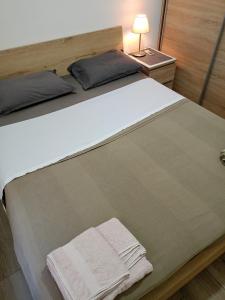 Posteľ alebo postele v izbe v ubytovaní Athens Center Cosy Apartment