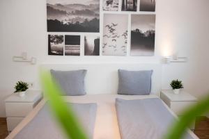 Postel nebo postele na pokoji v ubytování Apartmenthaus ROSE