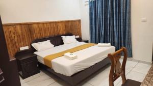 Postel nebo postele na pokoji v ubytování Divine Bliss Beach Resort