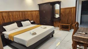 Postel nebo postele na pokoji v ubytování Divine Bliss Beach Resort