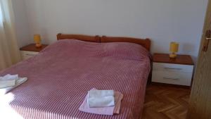 Postel nebo postele na pokoji v ubytování Apartment Milan
