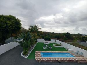 Bazén v ubytování Villa Bella Quatre Cocos nebo v jeho okolí