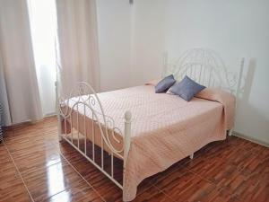 Postel nebo postele na pokoji v ubytování Villa Bella Quatre Cocos
