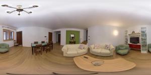 a large living room with a table and chairs at San Lorenzo B & B in Ruoti