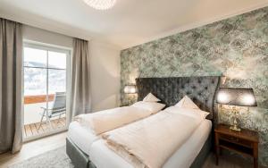 Posteľ alebo postele v izbe v ubytovaní Wohlfühlresort Peternhof