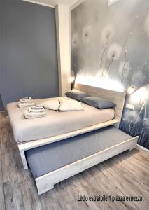 Postel nebo postele na pokoji v ubytování Magazzini Sasso Guest House