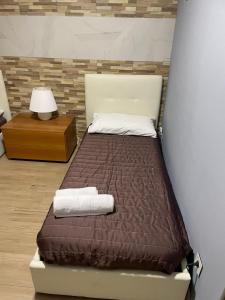 Postel nebo postele na pokoji v ubytování Milano 3 Astra Apartments & Rooms PT