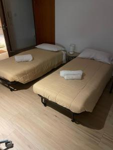 Postel nebo postele na pokoji v ubytování Milano 3 Astra Apartments & Rooms PT