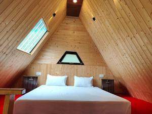Sukoon Resort客房内的一张或多张床位