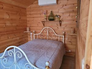 Posteľ alebo postele v izbe v ubytovaní Au petit Chalet