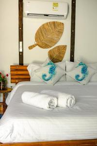 Marazao Beach Hotel & Spa客房内的一张或多张床位