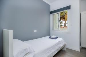 Mallorca Rooms Can Pastilla客房内的一张或多张床位