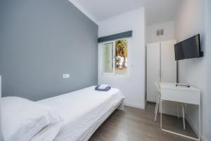 Mallorca Rooms Can Pastilla客房内的一张或多张床位