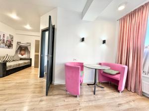 En eller flere senge i et værelse på Квартира в новострое на Ботанике