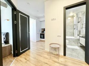 Et tv og/eller underholdning på Квартира в новострое на Ботанике + 37 billeder