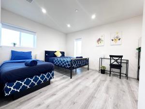 Katil atau katil-katil dalam bilik di Stylish 3 BR/3BR family house