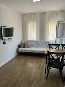 TV a/nebo společenská místnost v ubytování Can Apt