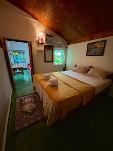 Katil atau katil-katil dalam bilik di Bramha Home Stay