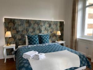 Un pat sau paturi într-o cameră la Le Château de Bel Air - Suite de 125m2 - Expérience unique