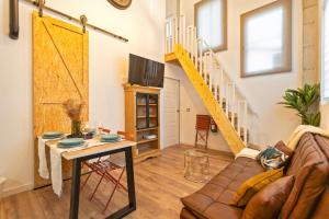 Un televizor și/sau centru de divertisment la Apartamento Beniloft - Housevanlive