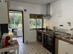 Kuchyň nebo kuchyňský kout v ubytování La casina + 5 fotografií