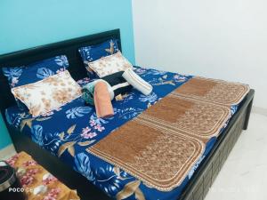 Letto o letti in una camera di Maa vaishno paying guest house