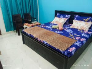Letto o letti in una camera di Maa vaishno paying guest house