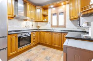 A kitchen or kitchenette at Raco de Lis